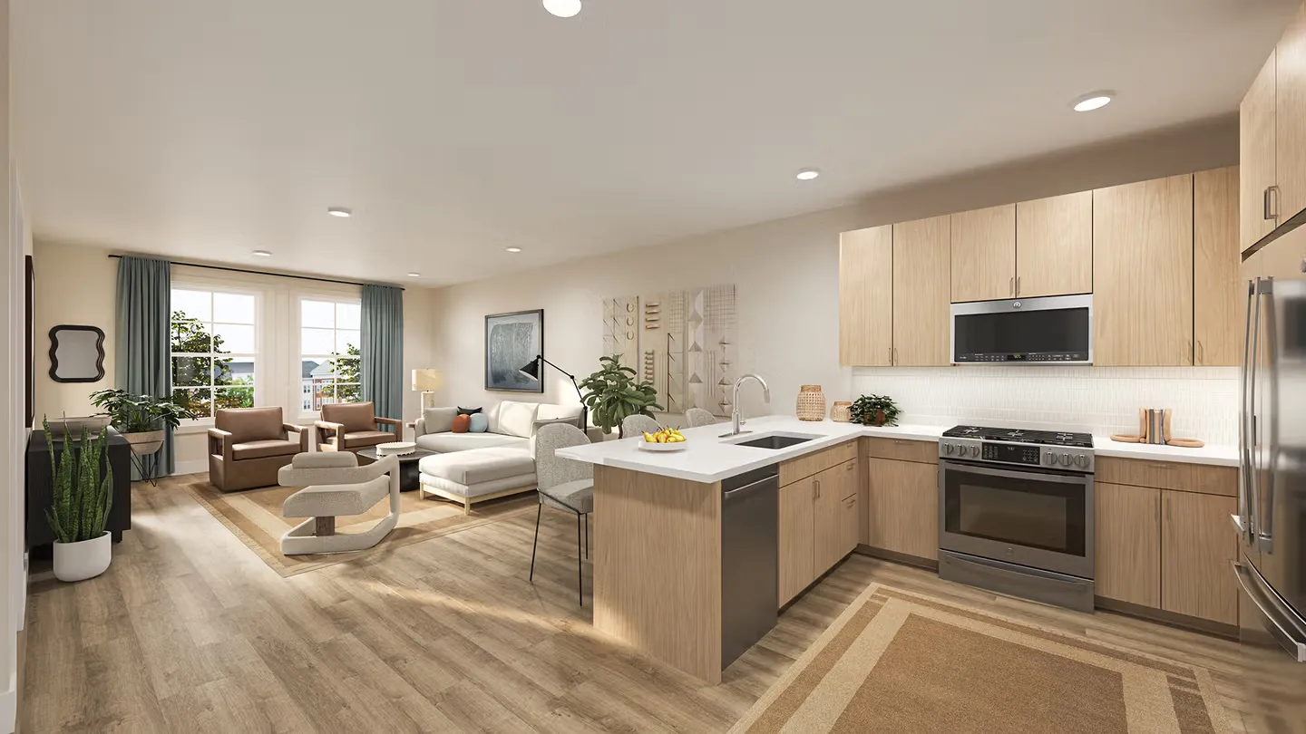 Modern open-concept kitchen and living room with wood floors, island seating, and large windows.